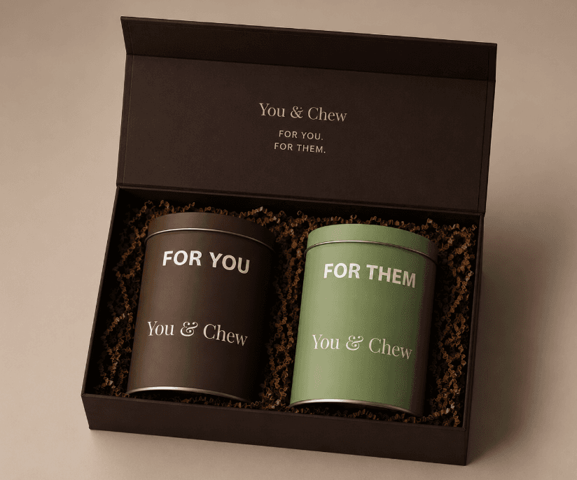 The Duo Set gift box, open, with the FOR YOU and FOR THEM tins nested inside
